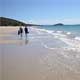 Matt and I walking on an empty beach