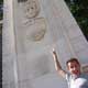 Wally pointing at a Canada monument