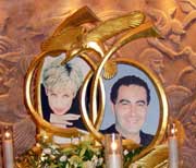 The Queen and Knave of Hearts - aka Diana and Dodi. Cloying shrine underneath Harrods