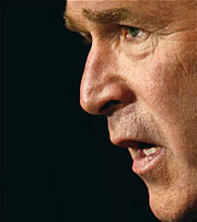 George W Bush. President of the USA. Again