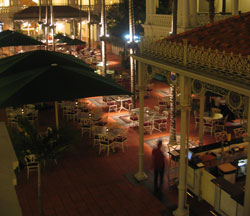 Looking down into Raffles Hotel from the Long Bar