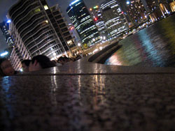 View of Circular Quay at night from Opera Bar