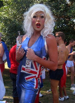 Surprised drag queen in Australian colours spangly suit.