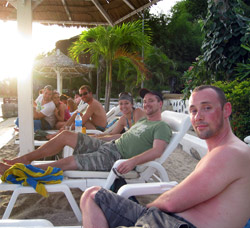 Mikey, Beth, Neil, Debs, Tim, and my sunburnt self on sunloungers on Koh Pha Ngan
