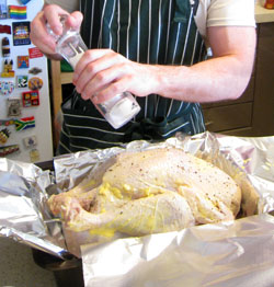 Christmas turkey being seasoned by moi